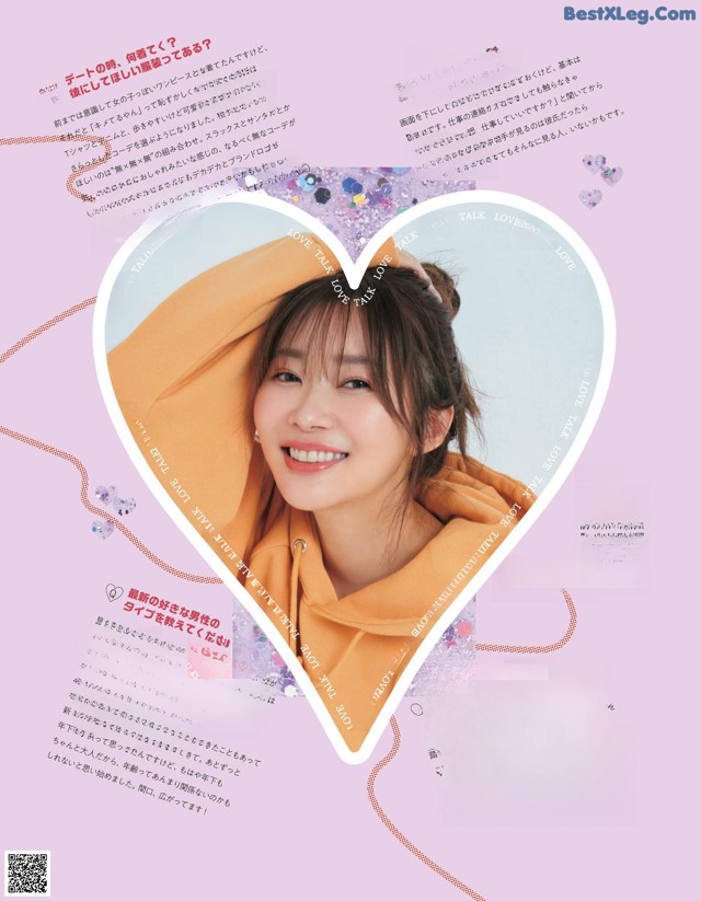 A magazine page with a picture of a girl in a heart shaped frame.